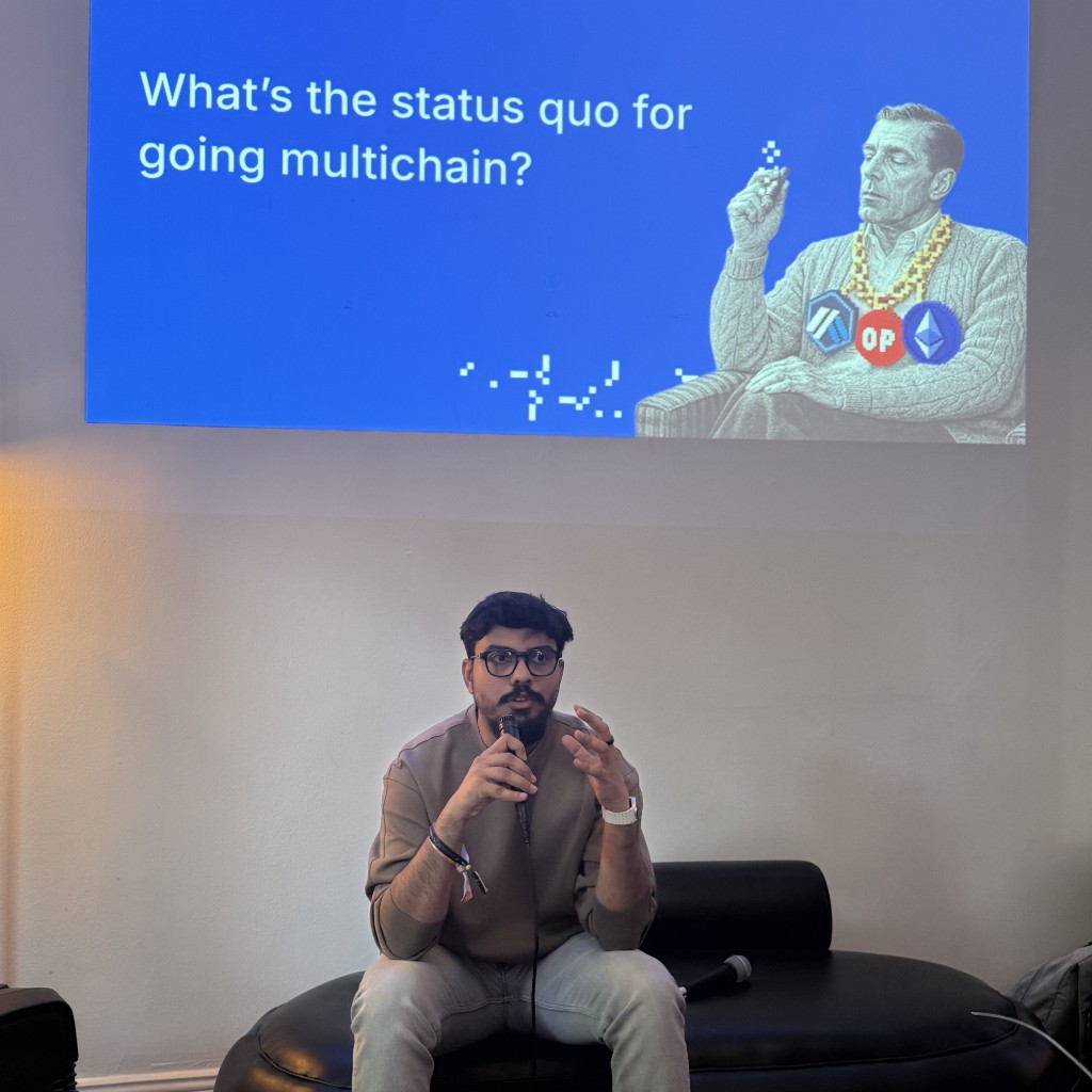 Speaker presenting on multichain strategies at a live event