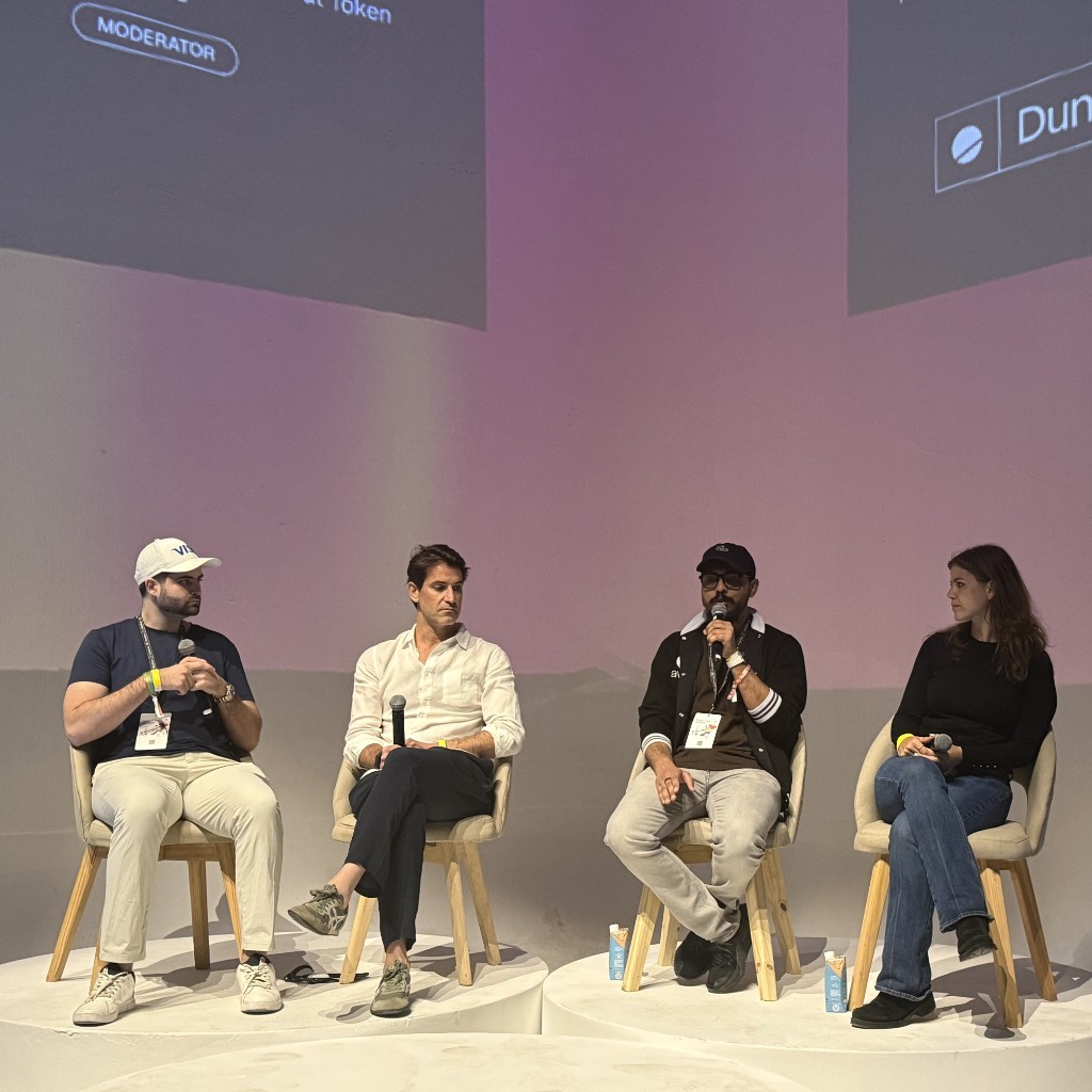 Panel discussion at a blockchain industry event